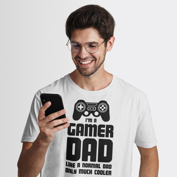 Gamers collection banner with a gamer dad holding his phone and smiling