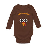 Thumbnail Cute Lil' Gobbler Turkey Face - Funny Thanksgiving Baby Long Sleeve Bodysuit Brown 1